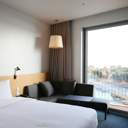 Nest Hotel Инчон Екстериор снимка A room at the hotel
